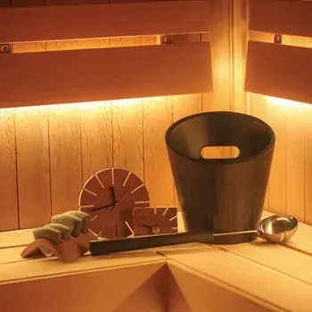 SAWO sauna accessories collection including buckets, ladles, and thermometers